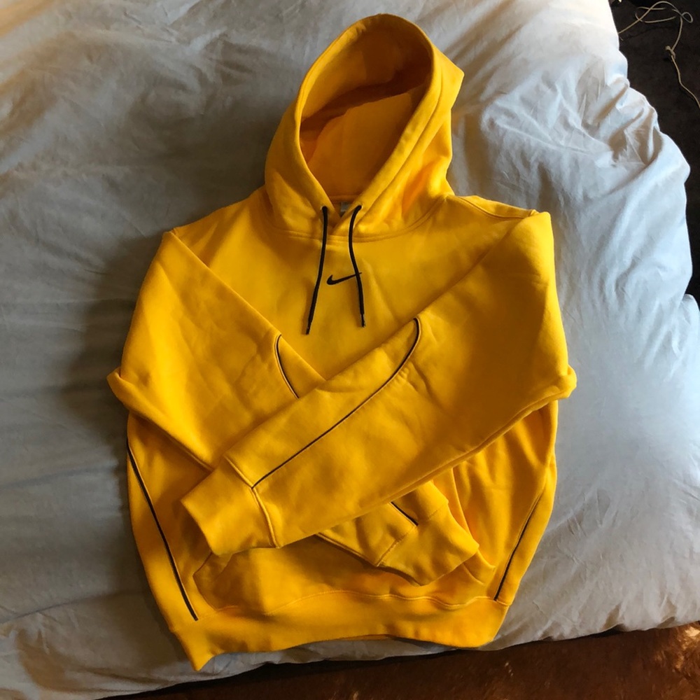 Gold Nocta hoodie with black trim. Worn once. Perfect/brand new condition.